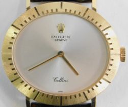 A Rolex Cellini ladies wristwatch, with oval silvered dial, in gold outer casing, stamped 18K to rev
