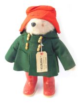 A Gabrielle Designs 1970s Paddington Bear, with green felt duffel coat and red Dunlop wellingtons, 4