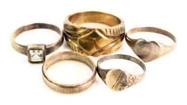 A group of assorted dress rings, comprising three white metal dress rings, unmarked, a white and yel