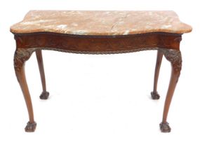 A late 19thC Chippendale Revival serpentine fronted side table, with rouge marble top (AF), the frie