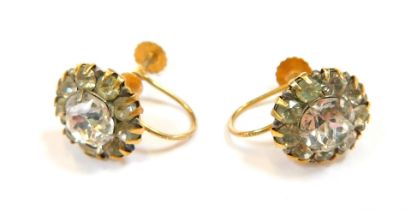 A pair of cluster earrings, each set with imitation diamonds, in a claw setting, in yellow metal fra