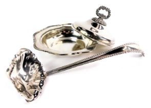 Two silver plated items, comprising a silver plated ladle, with fluted and moulded handle and a muff
