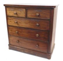 A Victorian mahogany chest, of two short and three long graduated drawers, turned drop handles, on a