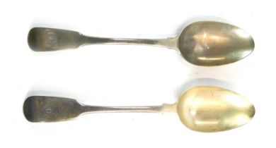 Two Victorian silver fiddle pattern serving spoons, one inscribed D, the other EJP, London 1814 and