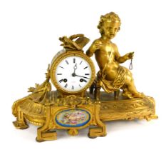 A 19thC French gilt metal mantel clock, the white circular enamel dial bearing Roman numerals for He