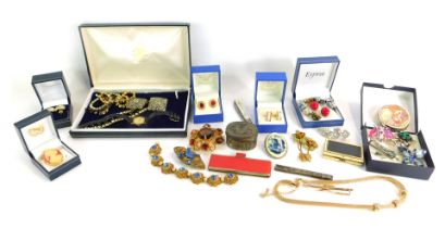 A group of assorted costume jewellery, comprising clip on earrings, silver pencil case, mother of pe