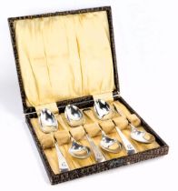 A set of six silver fiddle pattern teaspoons, each bearing the initial Y, Chester 1910, 3.35oz, in f