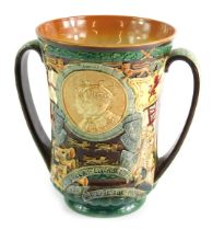 A Royal Doulton George VI Coronation loving cup designed by Charles Noke, with raised decoration cam
