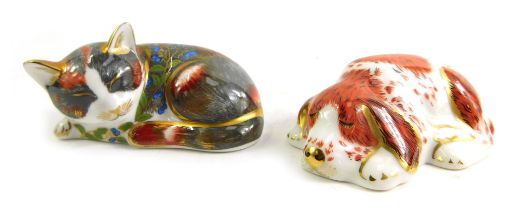 Two Royal Crown Derby porcelain paperweights, modelled as Puppy, an exclusive for The Royal Crown De