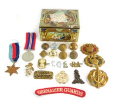 Assorted militaria, comprising a George VI 1939-45 Defence medal, 39-45 Star, military buttons, shou