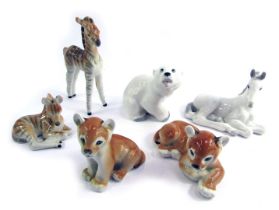 Seven USSR animal figures, comprising two seated tiger cubs, polar bear, white shire horse, and two
