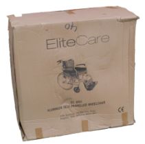 An Elite care wheelchair, boxed.