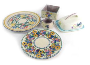 A group of Poole pottery, to include plate, 26cm diameter, butter dish and cover, 17cm wide, etc. (a