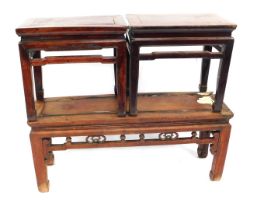 Three Chinese hardwood side tables. (AF)