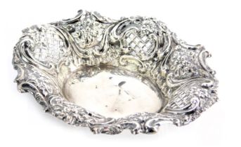 An Edward VII silver bonbon dish, with a pierced and hatched floral border, maker WN, Sheffield 1903