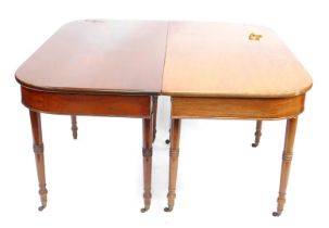 An early 19thC mahogany D end dining table, with plain frieze raised on slender tapered legs with ri