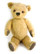 A plush jointed mohair Teddy bear, 40cm long.