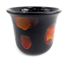 A Poole pottery planter, on a blackened ground with orange disc decoration, stamped to underside, 13