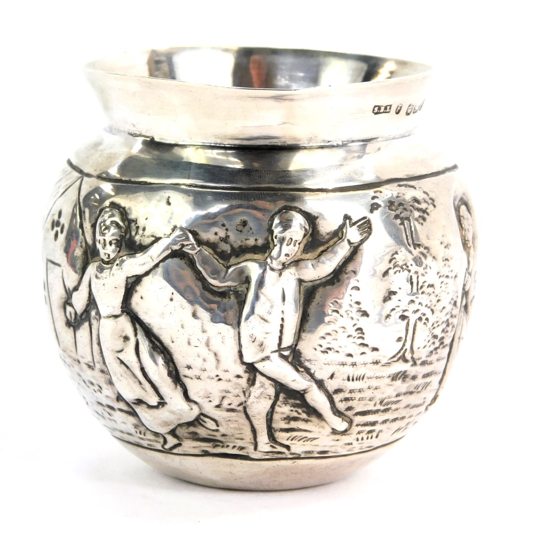 A Victorian silver vase, with embossed design of figures with trees and buildings, maker SBL, Sheffi