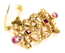 A ruby, garnet and seed pearl bar brooch, formed as two bows on single pin back with safety chain, y