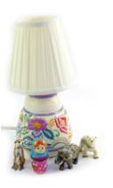 A Poole pottery table lamp, impress number 805, painted with sprays of mixed summer flowers, with sh