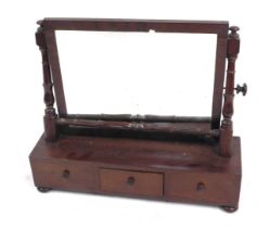 A 19thC mahogany toilet mirror, the base fitted with single drawer, flanked by two dummy drawers, wi