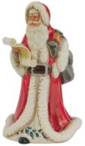 A Royal Doulton porcelain figure modelled as Father Christmas, 22cm high, boxed.