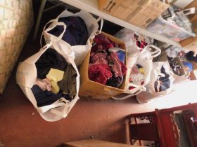 Assorted clothing and accessories, knitwear, jumpers, shirts, jeans, etc. (all under one table)