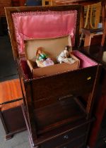 An oak sewing box and small quantity of costume dolls.