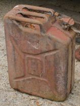 A red metal petrol can.