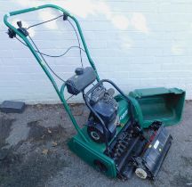 A Suffolk Punch cylinder petrol 14S lawn mower, hay forks, etc. (a quantity)