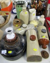A group of stoneware foot warmers, an Esso blue paraffin lamp, etc. (a quantity)