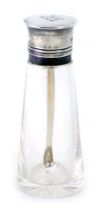 A George V silver topped and moulded glass scent bottle, the screw on lid with inset silver spoon, L