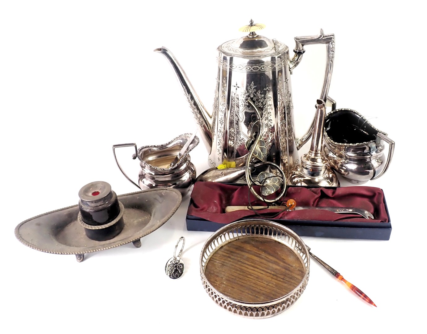 Various silver and silver plated wares, comprising a silver plated coffee pot, wine funnel, cheese k