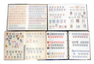 Philately. Four stamp albums, comprising Netherlands, central America, middle east and African 1920s