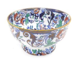 An Amherst ironstone bowl, with a orange rim on a white ground, with blue and orange flowers, 16cm h