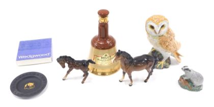 Named ceramics, comprising a Beswick barn owl, a Bell's Scotch whisky empty decanter, two Beswick br