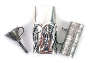 A group of white metal trinkets, comprising an Ottaviani silver Art Nouveau lighter case, 0.96oz, an