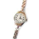 An Everite 9ct gold ladies wristwatch, with a silvered watch head in yellow metal casing, 1.5cm diam