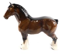 A Beswick brown shire horse, 27cm high.