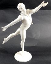 A Goebel figure of a male ballerina, in waistcoat on circular foot, stamped Frobek, 33cm high.