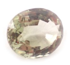 A loose smoky quartz gemstone, oval cut, 15.4mm x 13.2mm, 2.5g.