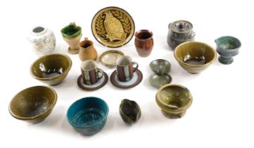 A quantity of studio pottery, comprising vases, coffee cans, studio pottery bowls, mainly unmarked,