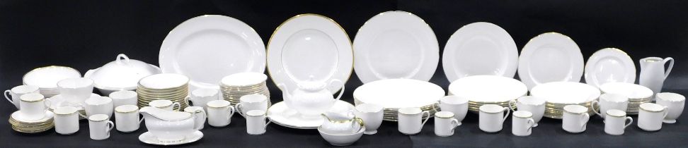 A Royal Doulton Gold Concorde pattern tea, coffee and dinner service, comprising ten teacups, eight