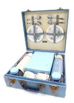 A Brexton picnic hamper, in blue with later Tupperware flask and mugs.