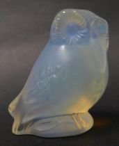 A Lalique of France opalescent glass owl, seated on perch, signed, 6cm high.