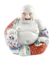 A 20thC Chinese porcelain figure of Budai, polychrome decorated in red, turquoise and blue floral de