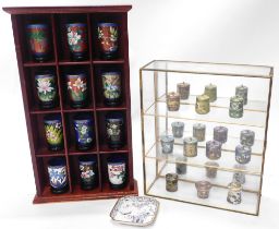 Modern Oriental cloisonne items, comprising twelve beakers, miniature storage jars and