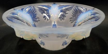 An opalescent glass frosted shade, of circular form with raised relief birds, unsigned, 21cm diamete