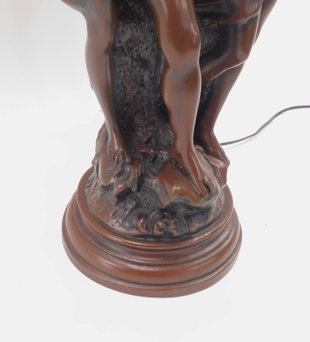 A bronzed resin table lamp, arched as two figures, with frosted glass shades, 76cm high. - Image 3 of 3